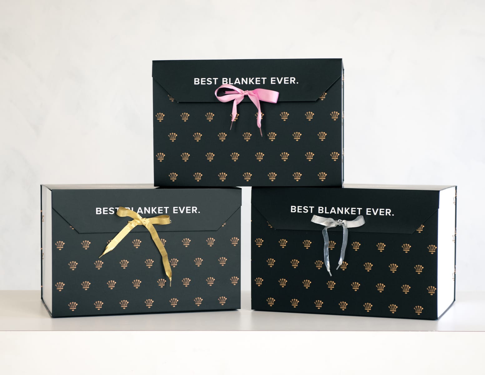 Gift Box featuring stylish designs and ribbons, perfect for gifting the Best.Gift.Ever!