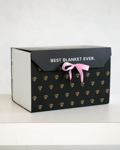 Gift Box featuring stylish design with text "BEST BLANKET EVER" and pink ribbon for a luxurious presentation.