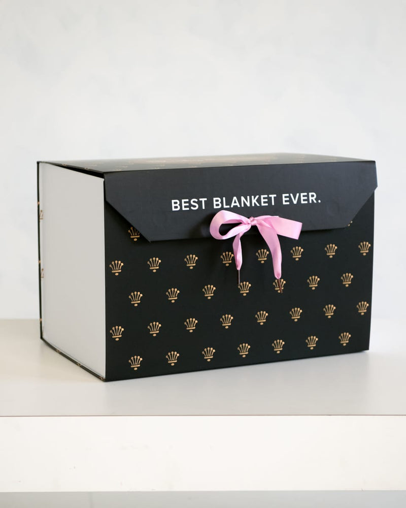 Gift Box featuring stylish design with text "BEST BLANKET EVER" and pink ribbon for a luxurious presentation.