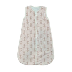 Light pink baby Hampton Blooms Wearable Minky Blanket with a subtle floral pattern.
