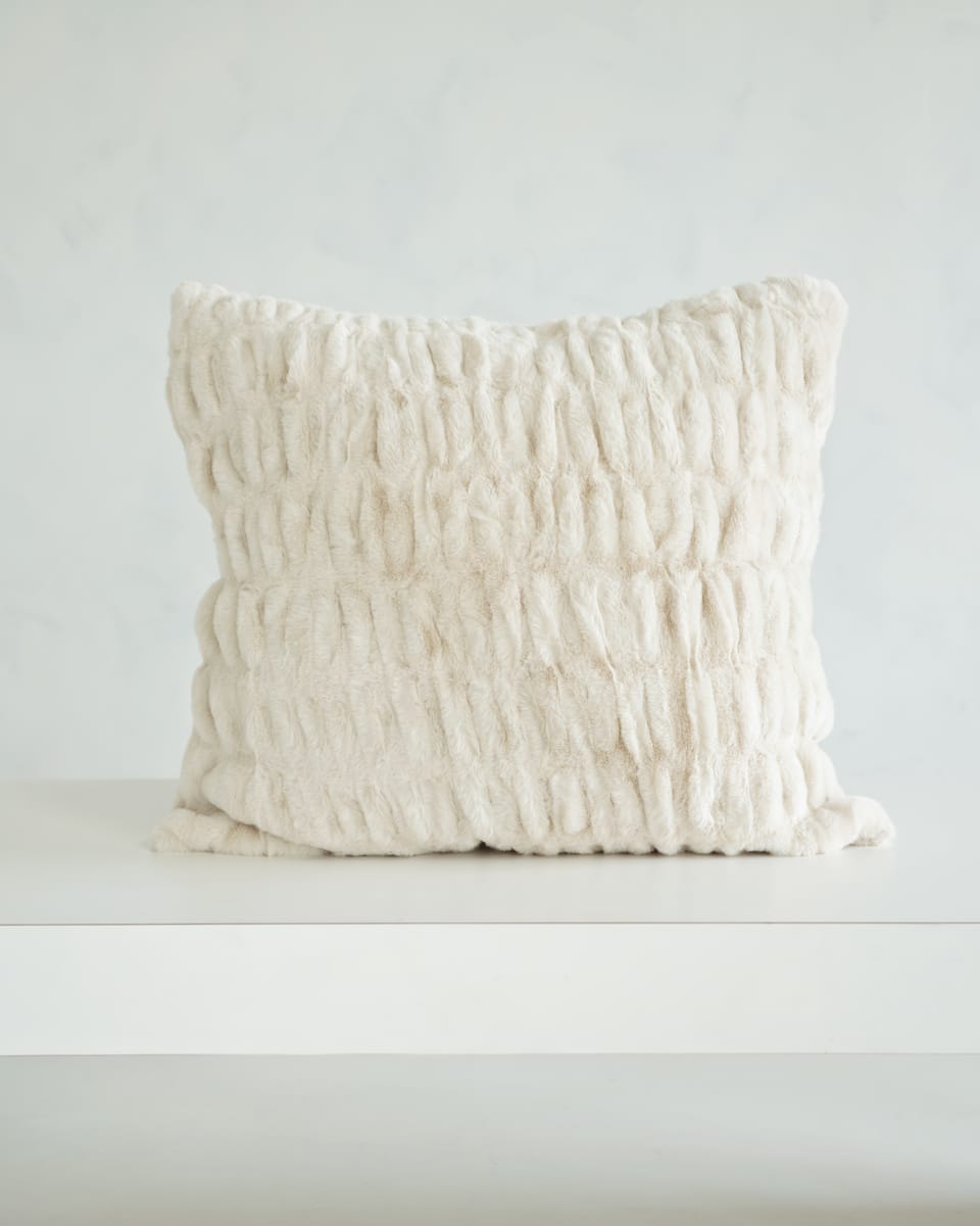 Hugs Ancient Scroll Sham showcasing its soft and cozy off-white fabric on a minimalist background.