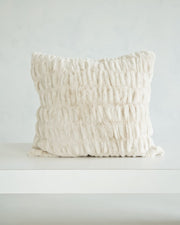 Hugs Ancient Scroll Sham showcasing its soft and cozy off-white fabric on a minimalist background.