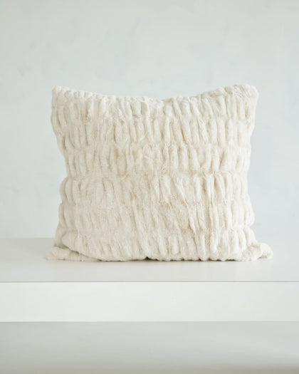 Hugs Ancient Scroll Sham showcasing its soft and cozy off-white fabric on a minimalist background.