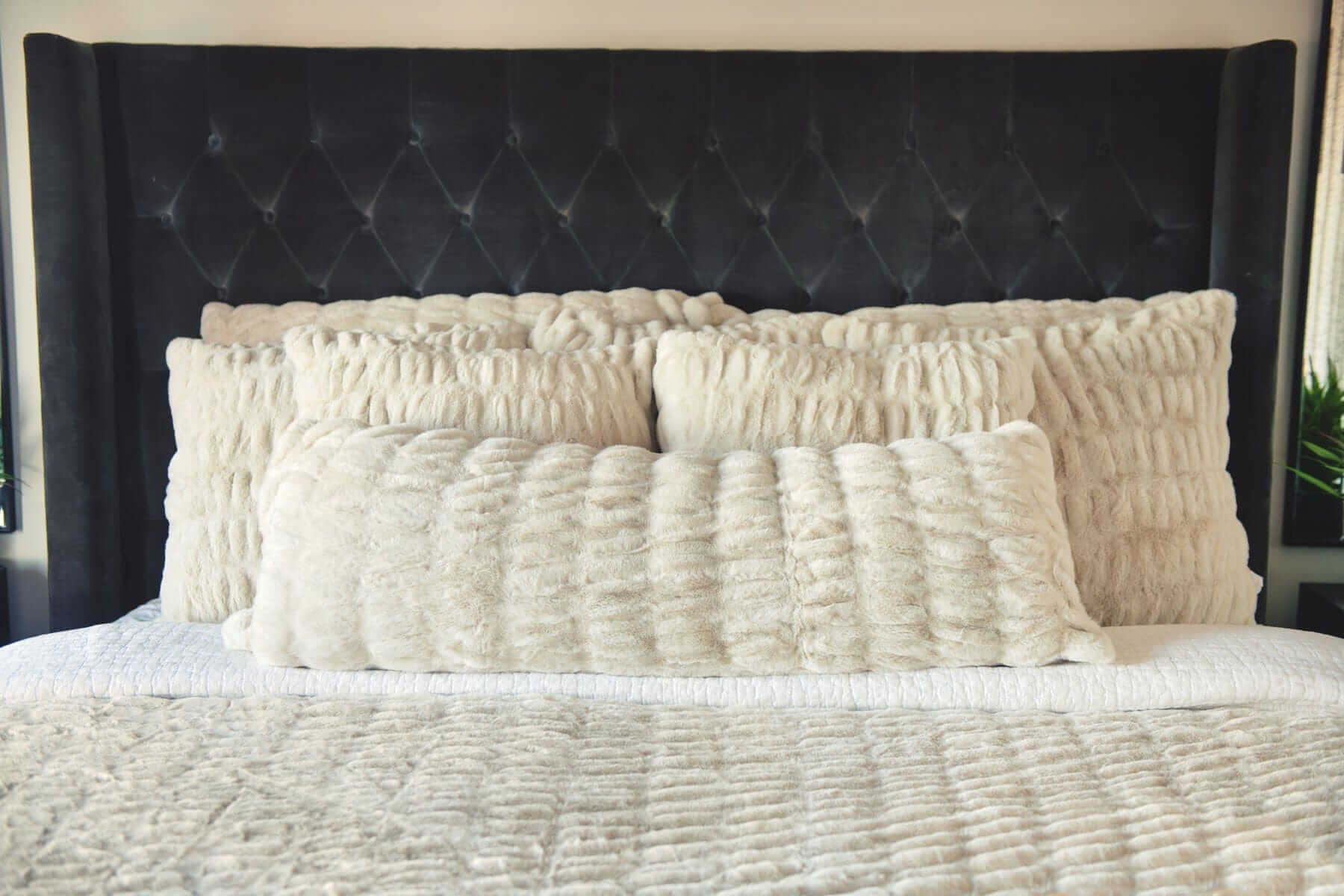 Bed with textured Minky Couture Hugs Ancient Scroll Sham pillows and duvet