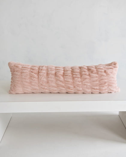 Hugs Blush Sham on a white surface, showcasing its soft, cozy blush fabric and inviting design.