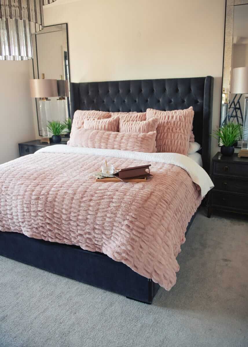 Pink Minky Couture Hugs Blush Duvet bedding styled on a bed.