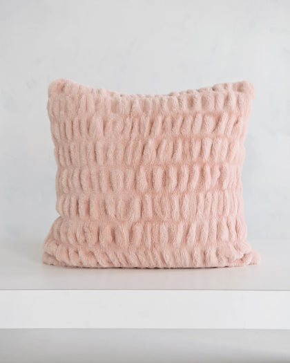 Cozy Hugs Blush Sham in soft pink fabric, perfect for adding comfort to any space.