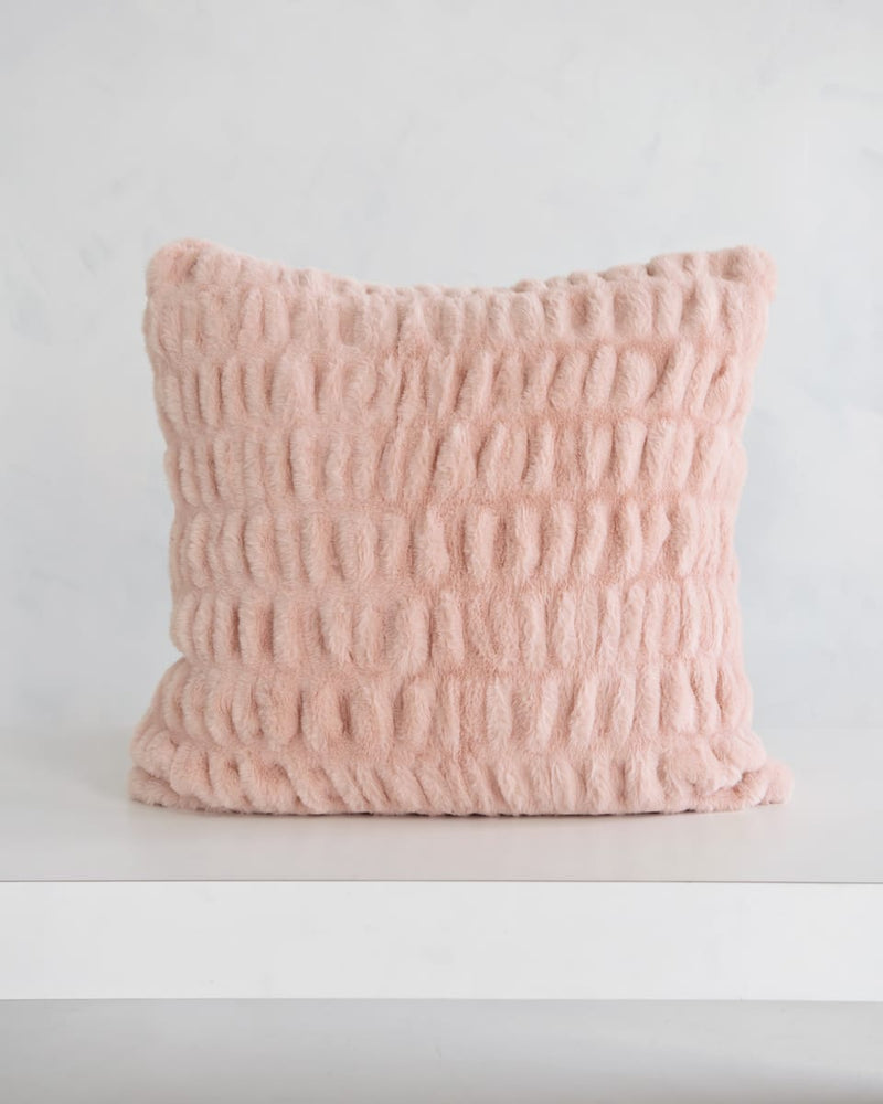 Cozy Hugs Blush Sham in soft pink fabric, perfect for adding comfort to any space.