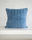 Plush blue decorative pillow showcasing the cozy texture of the Hugs Denim Sham for stylish comfort.