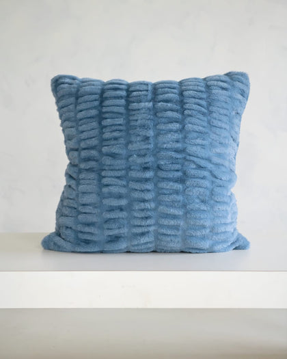 Plush blue decorative pillow showcasing the cozy texture of the Hugs Denim Sham for stylish comfort.