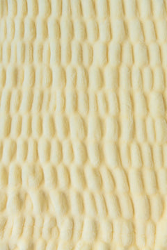 Close-up of a textured yellow fabric