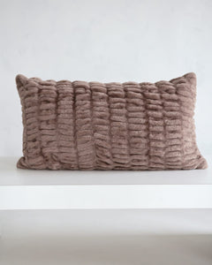 Hugs Milk Chocolate Sham on a white surface with a cozy textured design in light brown.