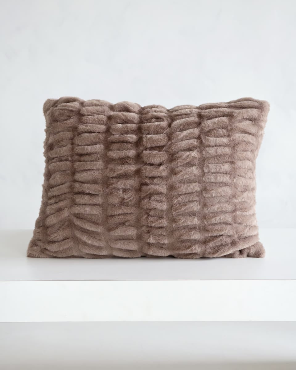 Hugs Milk Chocolate Sham displayed on a white surface, showcasing its cozy light brown textured fabric.