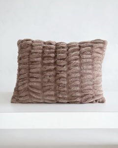 Hugs Milk Chocolate Sham displayed on a white surface, showcasing its cozy light brown textured fabric.