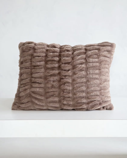 Hugs Milk Chocolate Sham displayed on a white surface, showcasing its cozy light brown textured fabric.