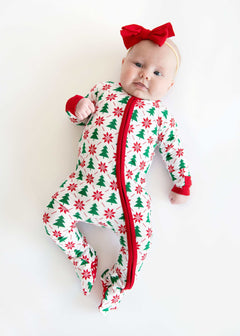 Infant Unisex Zipper Footie with Poinsettia and Tree featuring a baby in festive holiday design with red accents.