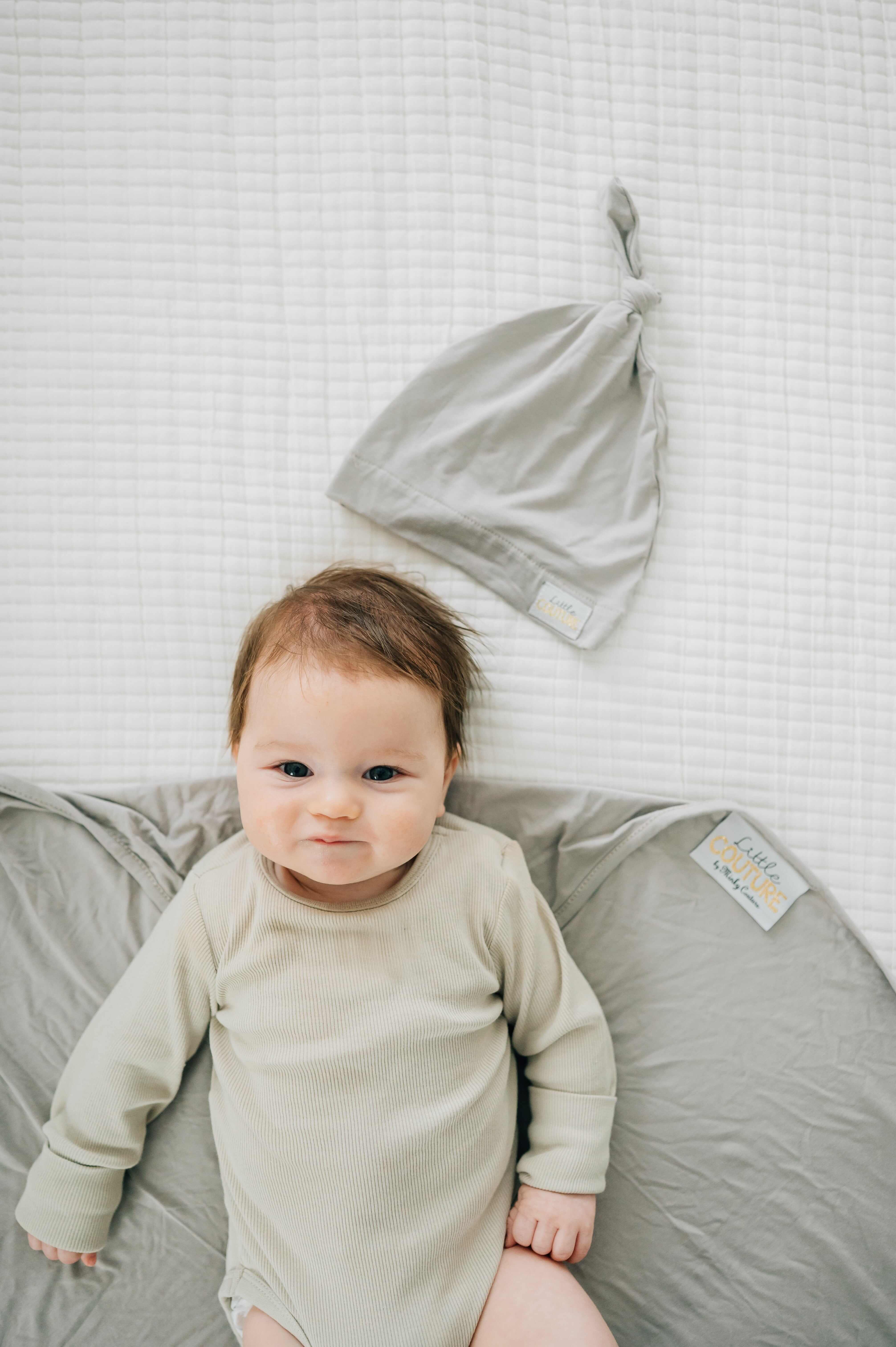 Swaddle and Hat Tranquil Dove soft bamboo set for babies with cozy swaddle and matching hat.