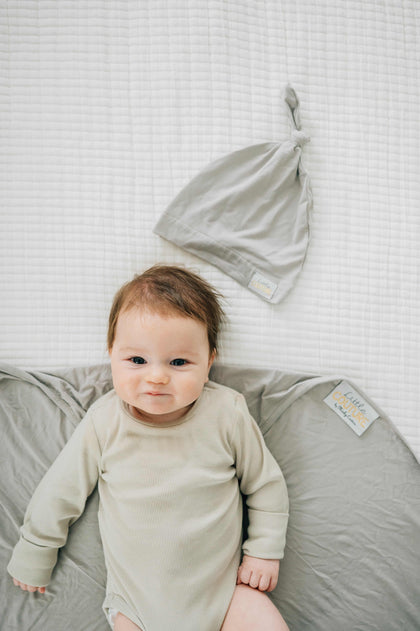 Swaddle and Hat Tranquil Dove soft bamboo set for babies with cozy swaddle and matching hat.