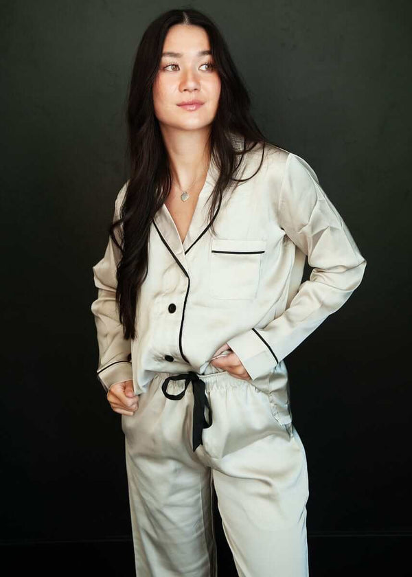 Model wearing Middle of the Night Pajamas Satin Ancient Scroll, featuring button-up style and elegant long sleeves.