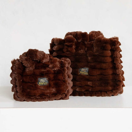 Two brown Minky Couture Annie bags in different sizes displayed side by side on a white background.