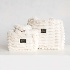 Two cream Minky Couture Annie bags in different sizes displayed side by side on a white background.