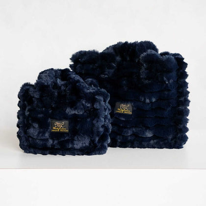 Two navy blue Minky Couture Annie bags Ripple Night Sky in different sizes displayed side by side.