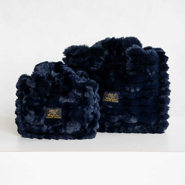 Two navy blue Minky Couture Annie bags Ripple Night Sky in different sizes displayed side by side.