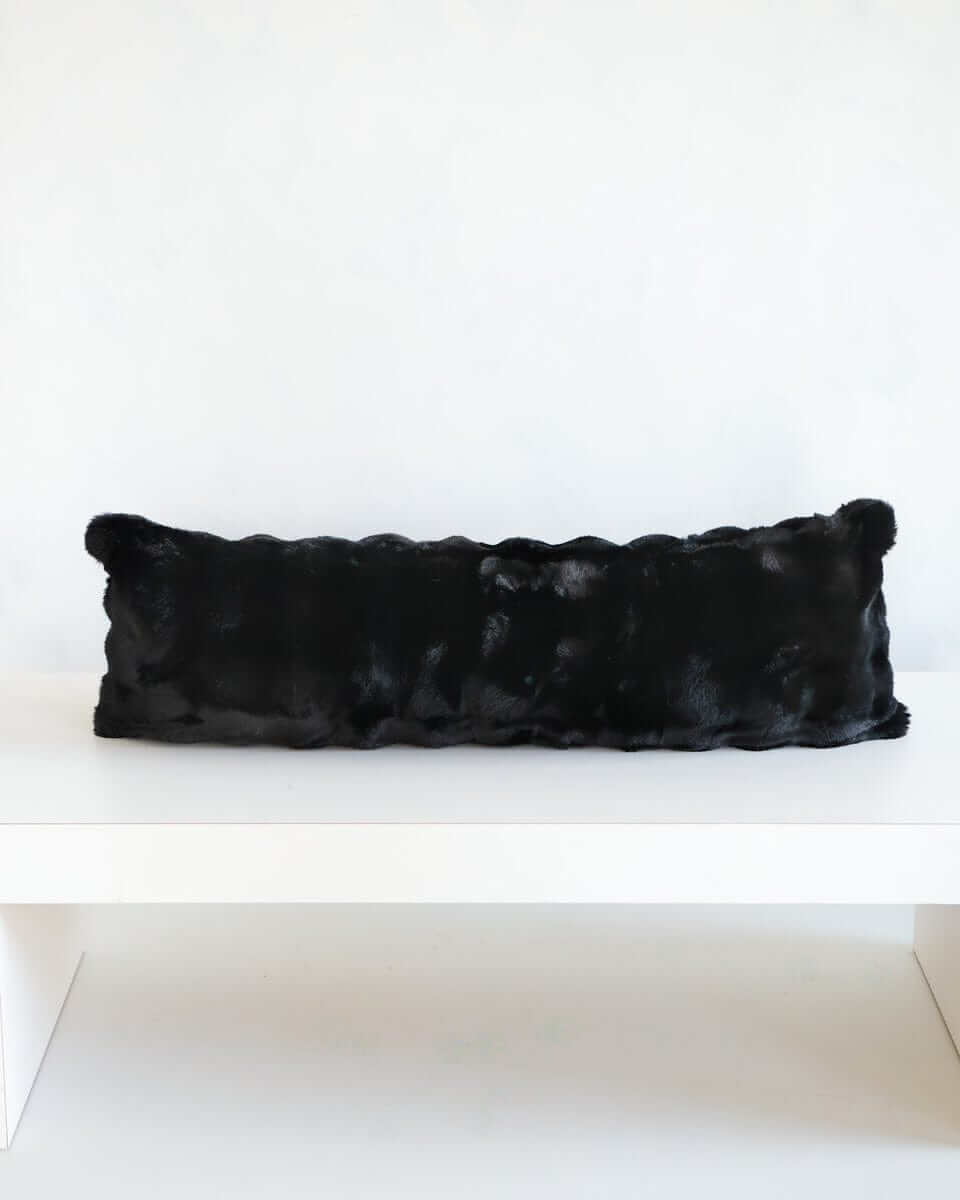 Black Cloud Sham on a white surface, showcasing its plush and stylish design for modern decor.