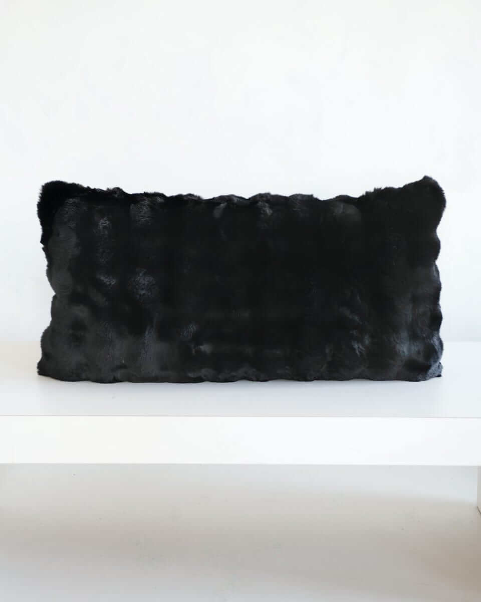 Black Cloud Sham displayed on a white surface, showcasing its plush fabric and modern design.