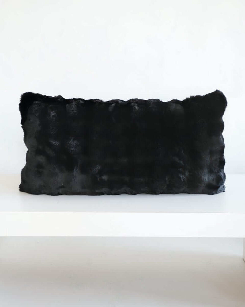 Black Cloud Sham displayed on a white surface, showcasing its plush fabric and modern design.