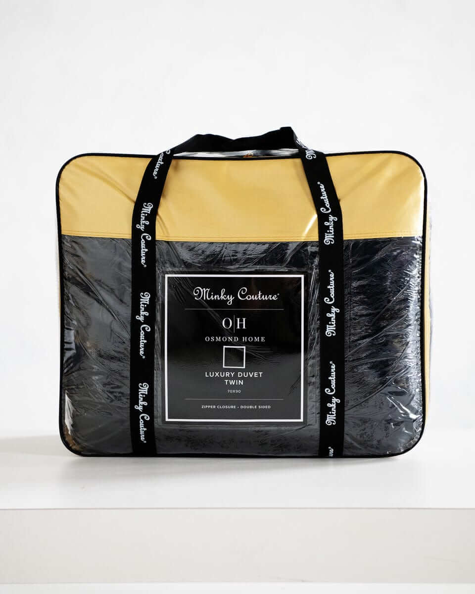 Black Cloud Duvet packaged in a stylish cover from Minky Couture x Osmond Designs collection, showcasing luxury and comfort.