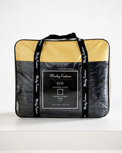 Black Cloud Duvet packaged in a stylish cover from Minky Couture x Osmond Designs collection, showcasing luxury and comfort.
