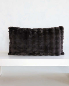 Charcoal Cloud Sham on a minimalist table, showcasing its plush fabric and elegant design for modern bedding.