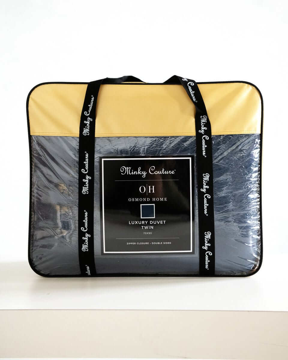 Navy Cloud Duvet packaged in a stylish carrier by Minky Couture for twin size bedding.