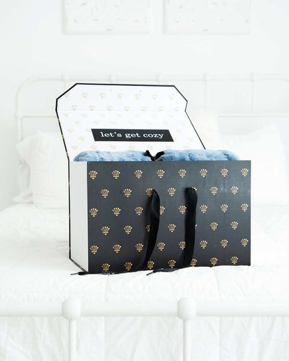 Side of luxurious Easter Box Pink gift packaging with the text 'BEST BLANKET EVER.' 