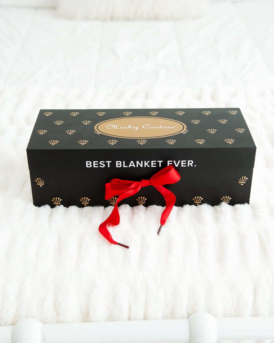 Gift Box featuring elegant design and red ribbon, perfect for sending the Best Gift Ever.