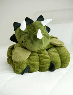 Huggable Dino plush toy with a triceratops head, perfect for imaginative play and cozy cuddles.
