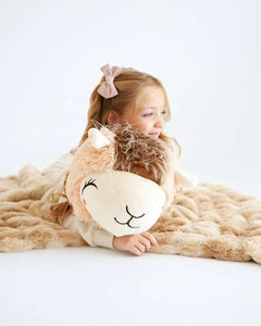 Huggable Llama plush companion nestled on a cozy blanket with a joyful child, perfect for cuddle time.