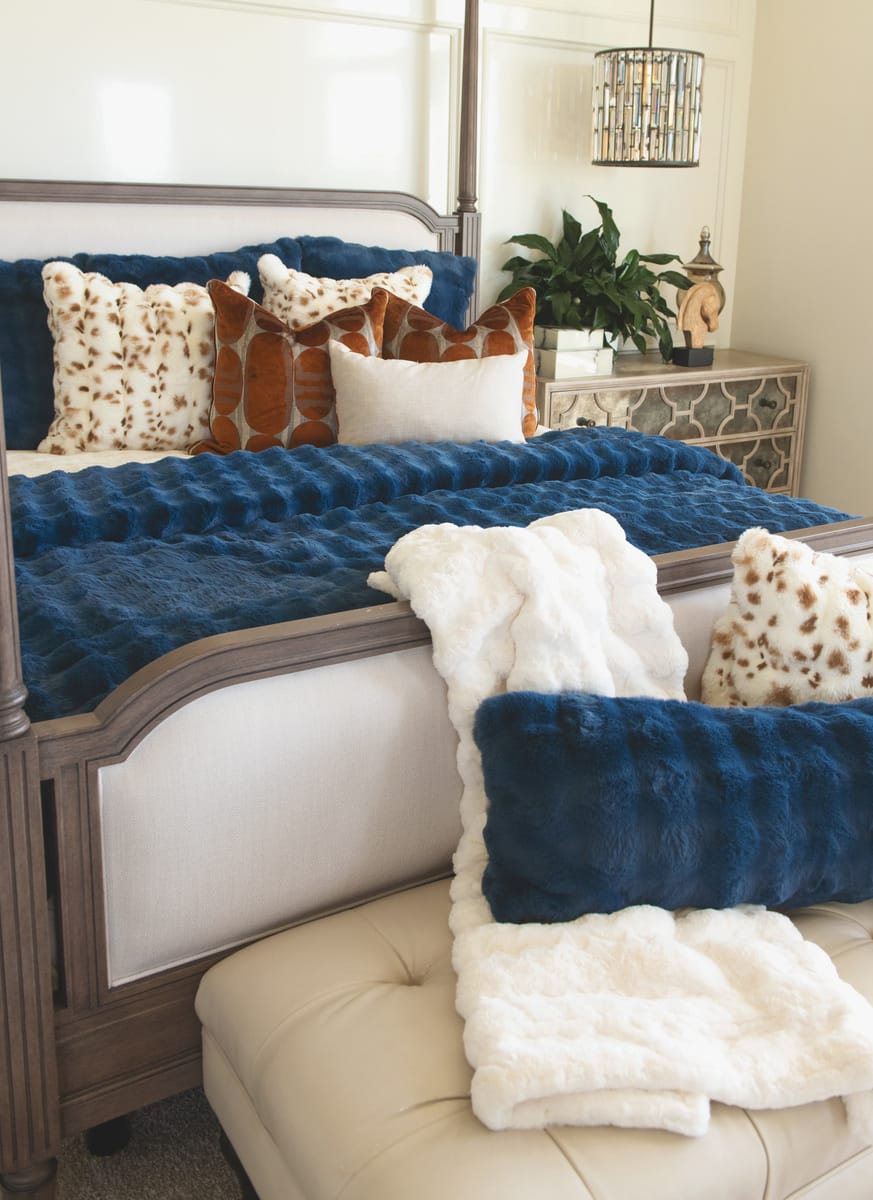 Navy Cloud Sham on a bed, featuring a luxurious deep blue hue and plush fabric, perfect for elegant décor.