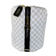 Beige and white checkered baby Oat Check sleeping bag Little Couture strap and gold hardware.