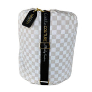 Beige and white checkered baby Oat Check sleeping bag Little Couture strap and gold hardware.