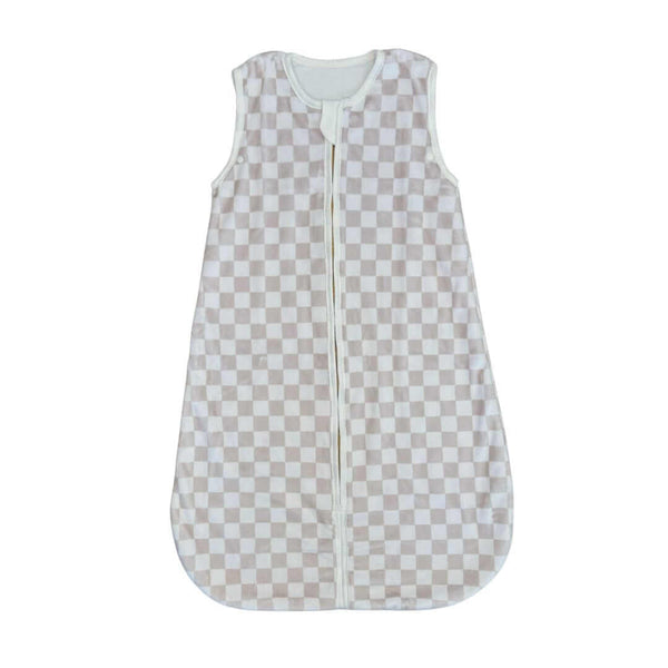 Beige and white checkered baby sleeping bag with zip front and sleeveless design on a white background.