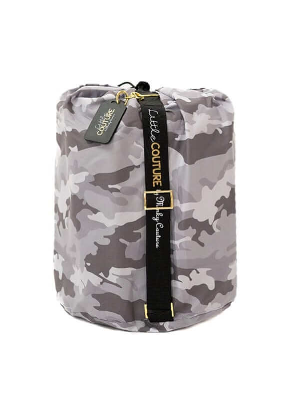 Camo Sleeping Bag rolled up with straps, featuring camouflage design and branding from Little Couture.