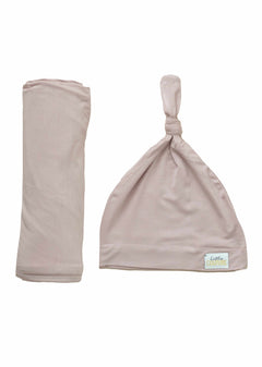 Swaddle and Hat Blush combo featuring a soft bamboo swaddle and matching hat for babies.