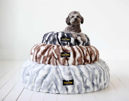 Cloudy Day Brown Pet Bed featuring a cozy dog sitting on a stylish fuzzy bed stacked three layers high.