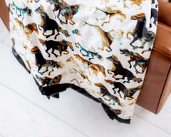 Stallion Blanket featuring watercolor horses on a cream background, perfect for western themed decor.