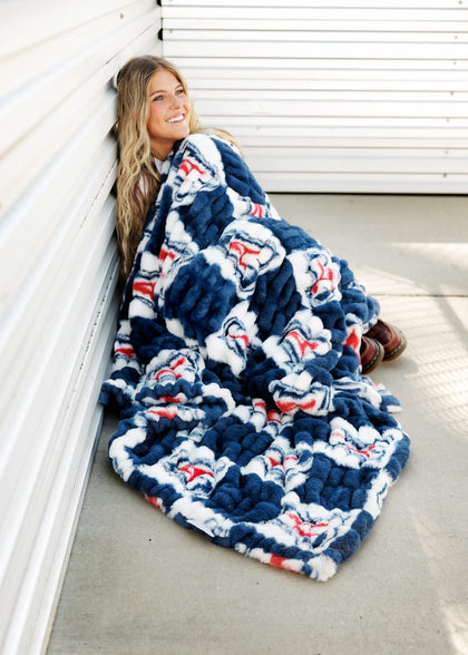 Cozy Hugs University of Arizona Wildcats Blanket featuring a checkered design in Arizona blue.