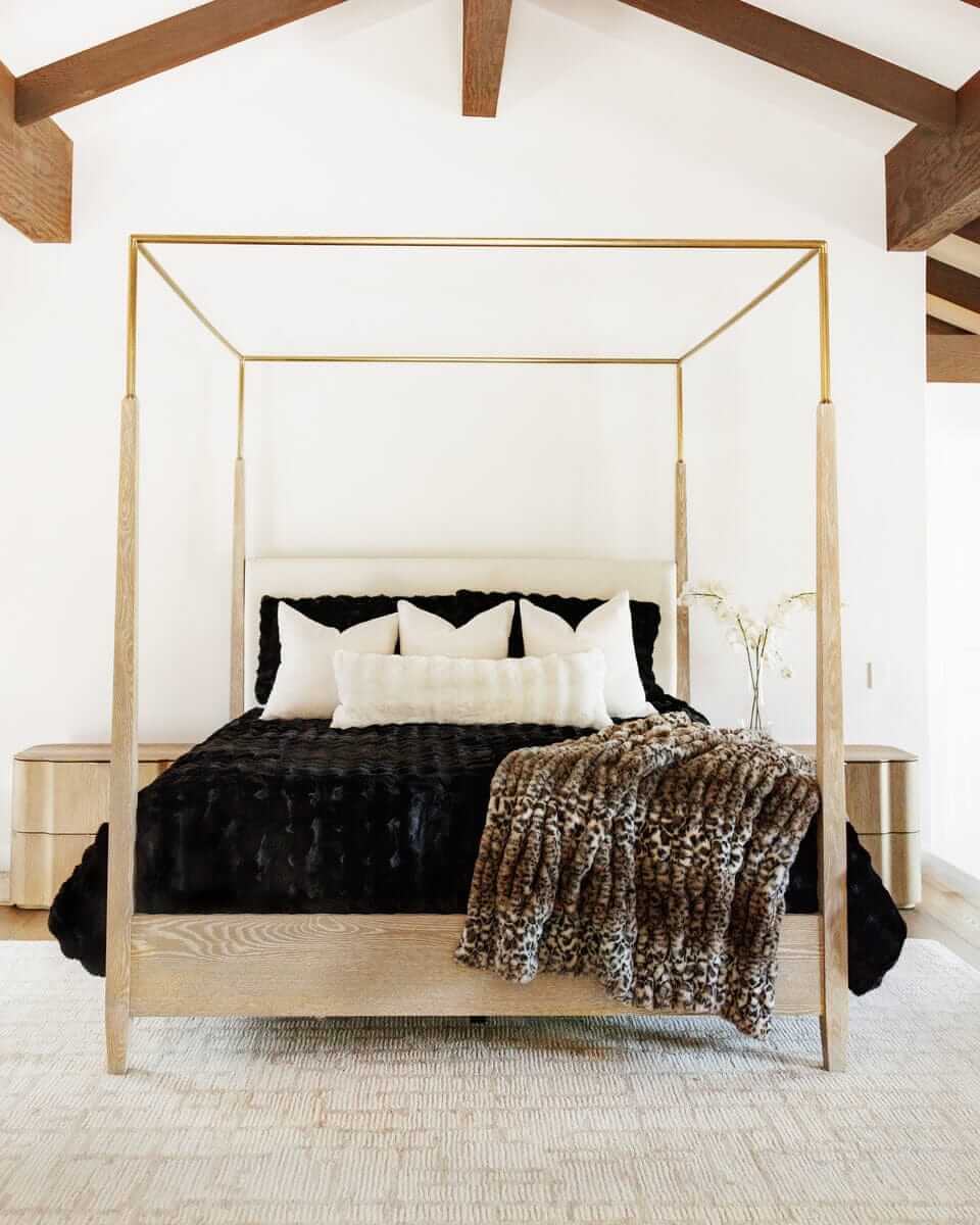 Luxurious Black Cloud Duvet on a stylish canopy bed, enhancing the modern bedroom decor with softness and elegance.