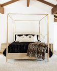 Luxurious Black Cloud Duvet on a stylish canopy bed, enhancing the modern bedroom decor with softness and elegance.