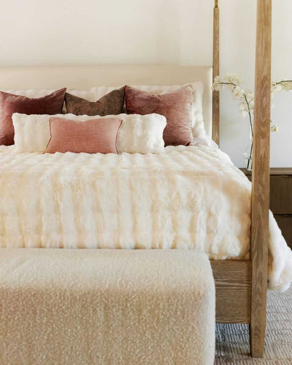 Cream Cloud Sham on a beautifully styled bed with plush pillows and a textured throw.